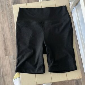 8 inch black outdoor voices biker shorts, size M